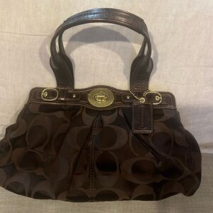 New Coach chocolate monogram handbag.